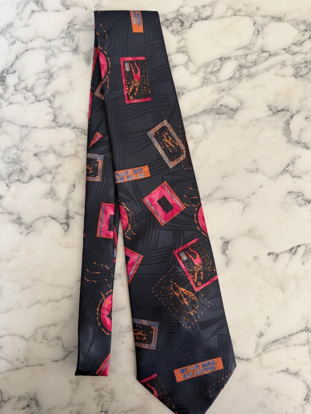 Vintage Jordache Pistage Stamp Navy Tie with Pink and Orange Geometric Decor